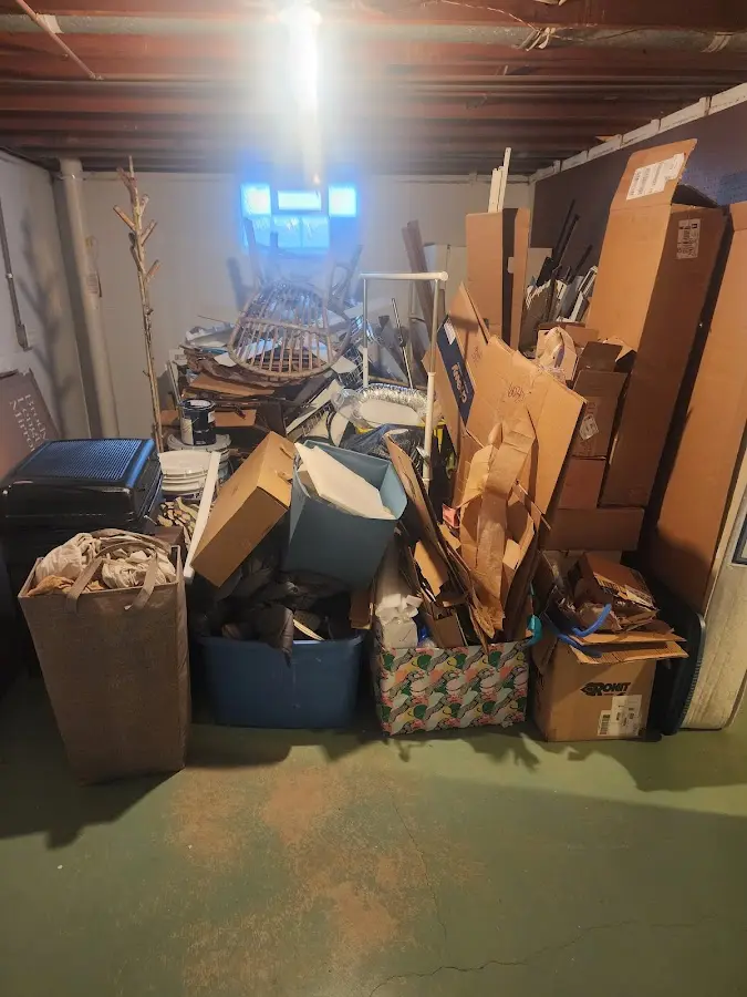 Roll-off dumpster container at job site for 6 Yard Dumpster Rental in Chubbuck